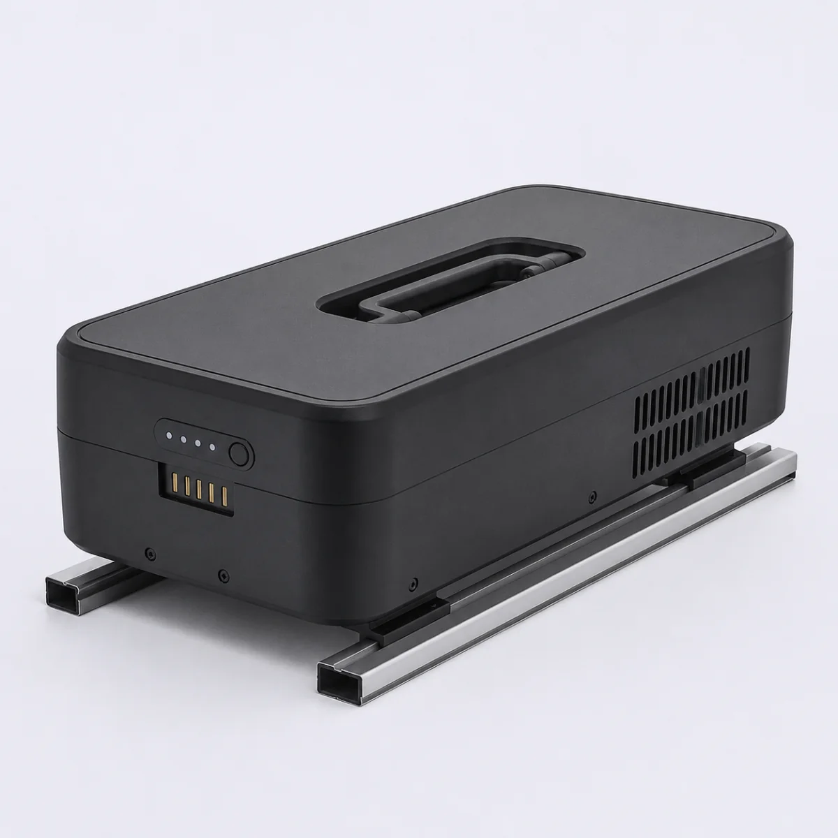 A cargo bike battery pack lying flat on its mounting rails